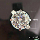 Versión coreana de un anillo de compromiso y propuesta de diamantes con simulación de capullo de flor de cuatro garras de moda de lujo ligero.