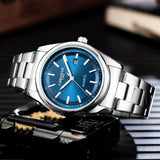Montre homme CHRONOS à quartz, étanche, avec date et affichage lumineux, en acier inoxydable, style décontracté et sportif.