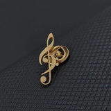 Broches minimalistas con símbolo musical de notas de metal ahuecadas para mujeres y hombres, productos culturales creativos, joyas y regalos.