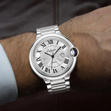 Reloj de lujo de alta gama para hombre, serie Balloon, esfera redonda, correa de acero inoxidable, calendario, accesorio de moda, ideal para diversas ocasiones.