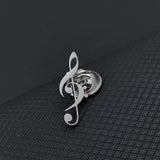 Broches minimalistas con símbolo musical de notas de metal ahuecadas para mujeres y hombres, productos culturales creativos, joyas y regalos.