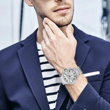 Reloj de lujo de alta gama para hombre, serie Balloon, esfera redonda, correa de acero inoxidable, calendario, accesorio de moda, ideal para diversas ocasiones.