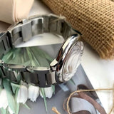 Reloj de lujo de alta gama para hombre, serie Balloon, esfera redonda, correa de acero inoxidable, calendario, accesorio de moda, ideal para diversas ocasiones.